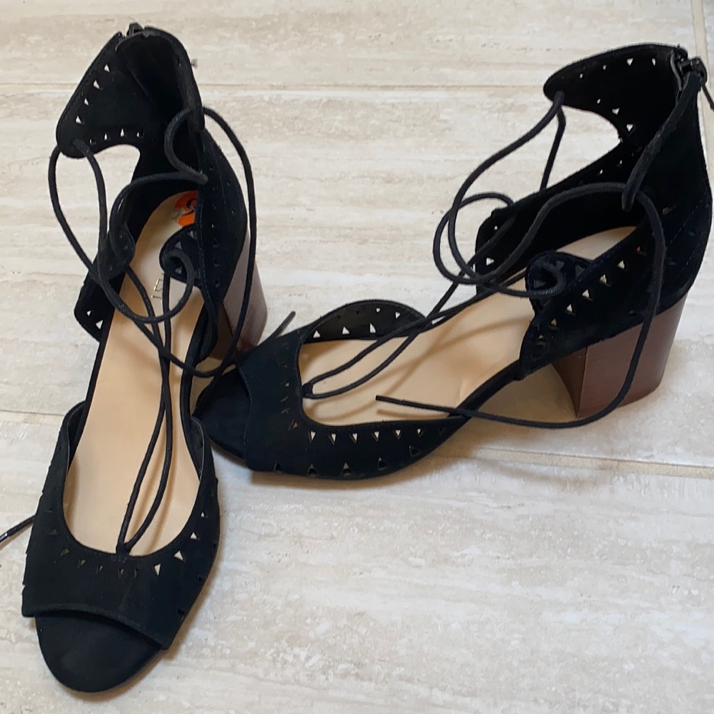 Lightly worn black lace up heels!